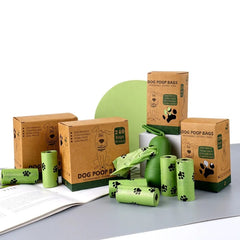 Biodegradable, scented pet waste bags with tie handles for easy and eco-friendly disposal.