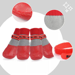 Waterproof, anti-slip dog socks with silicone soles for paw protection and grip on slippery surfaces.